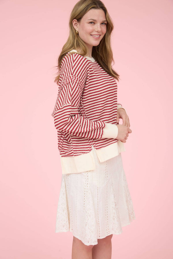 STRIPE EXPOSED SEAM SPLIT HEM LONG SLEEVE KNIT TOP: CREAM