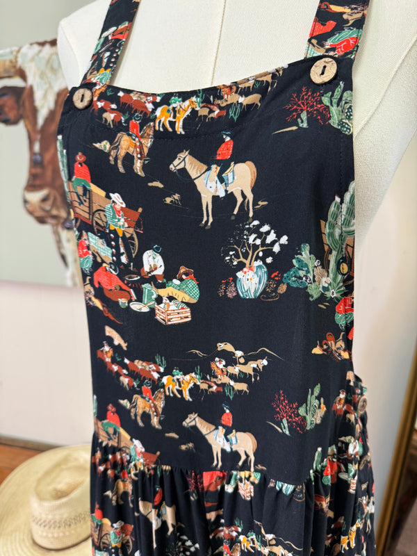 Turquoise Haven Ruffle Romper Black Wagon Overalls