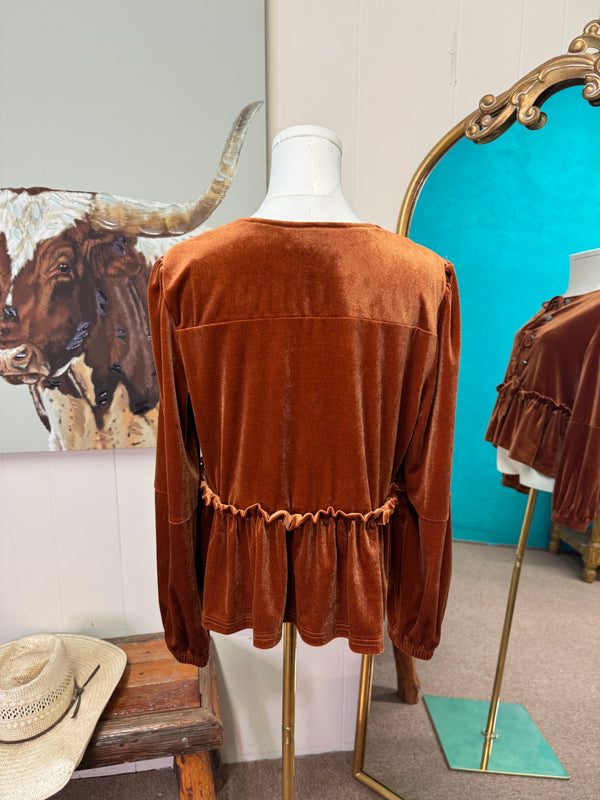 Rust velvet long sleeve peplum top, bow ties & conchos