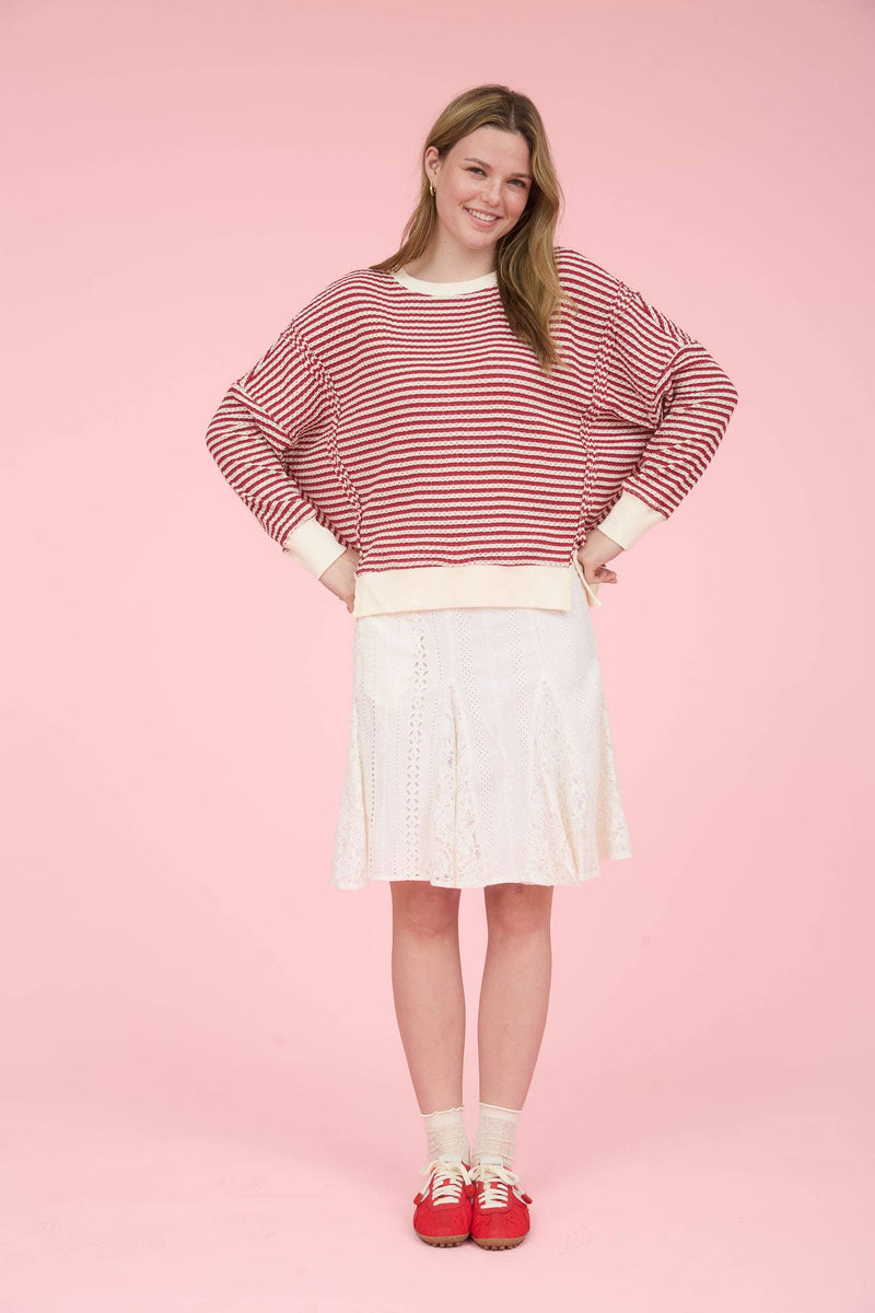 STRIPE EXPOSED SEAM SPLIT HEM LONG SLEEVE KNIT TOP: CREAM