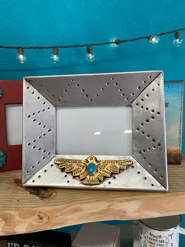 Silver picture frame with thunderbird